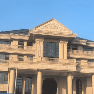 江门黄金麻别墅外墙干挂石材效果示例