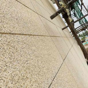 江门 黄金麻花岗岩荔枝面外墙干挂石材效果示例