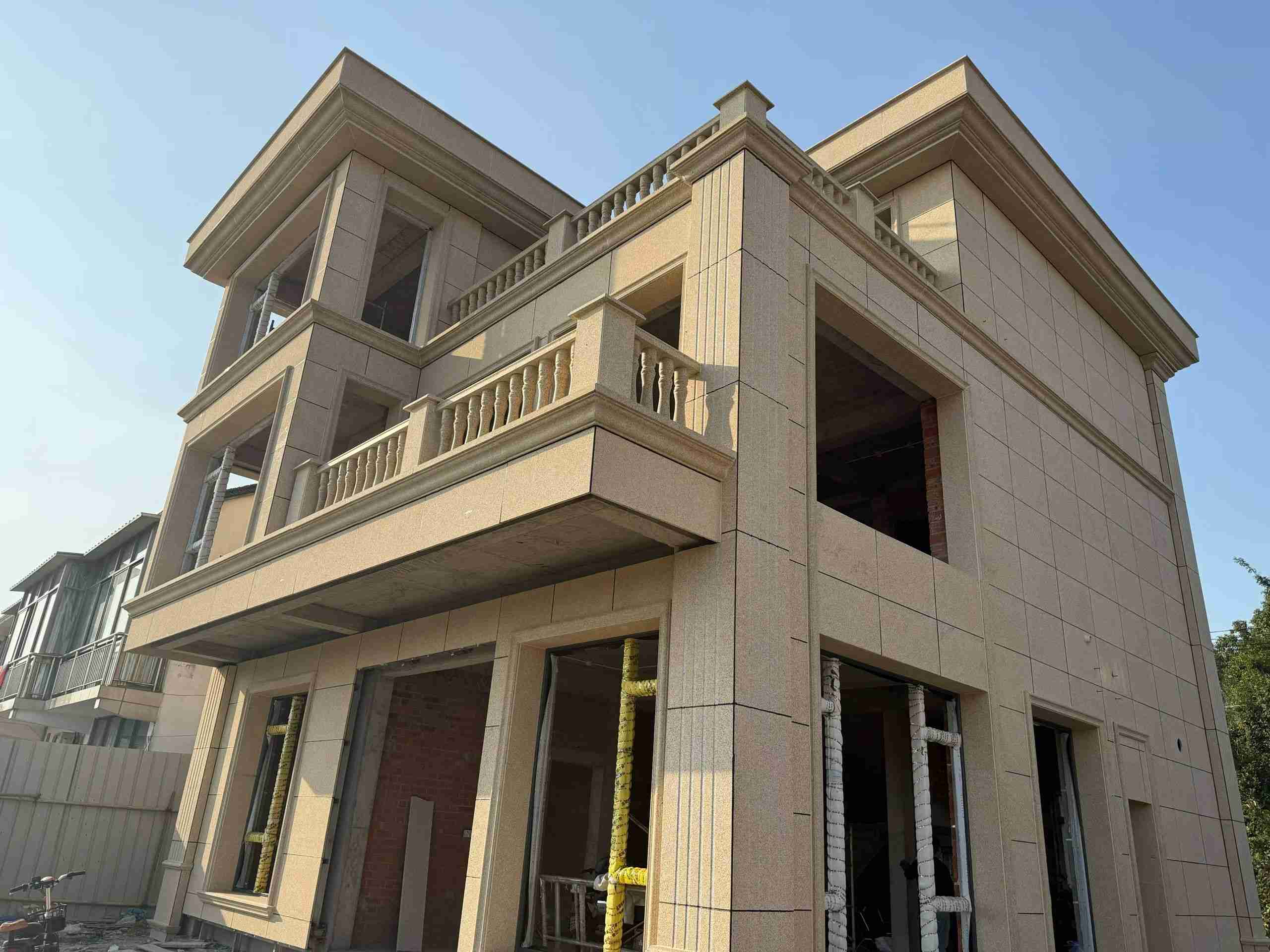 江门 黄金麻花岗岩石材荔枝面外墙干挂效果展示